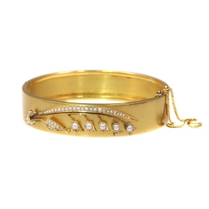 Antique gold bangle with lily of the valley motive